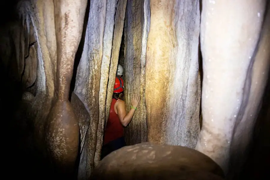 Caves of Belize Squeezing Between Rocks